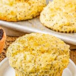 Lemon poppyseed muffins on a white plate.